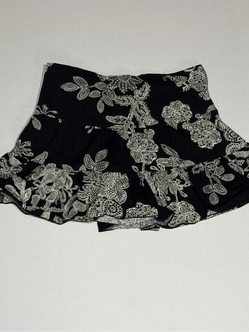 Urban Behavior Black Mini Skirt with White Floral Print